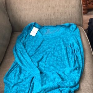 Sheer long sleeve tee.